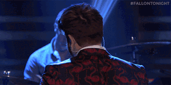 Bearded Guy Blow Giltter GIF