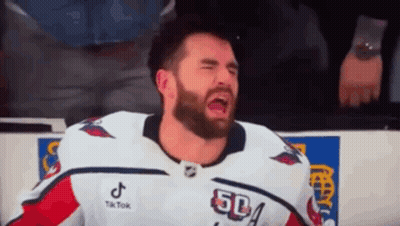 Bearded Hockey Player Crying On Bench GIF