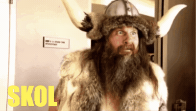 Bearded Horned Man In Fur Coat And Helmet Saying Skol GIF