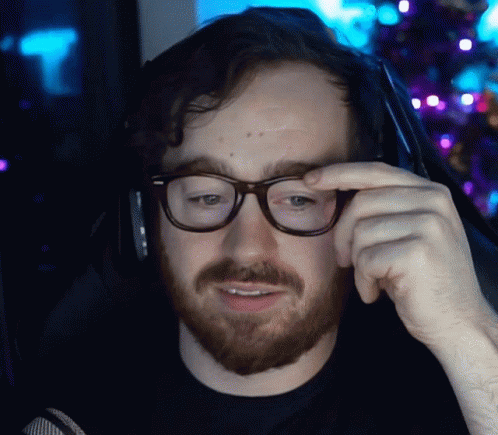 Bearded Man Adjusting Glasses GIF