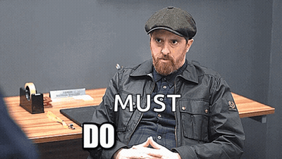 Bearded Man At Desk Saying Must Do GIF