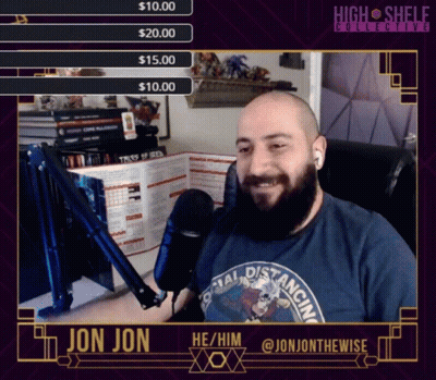 Bearded Man At Microphone Wearing Jon Jon Shirt GIF