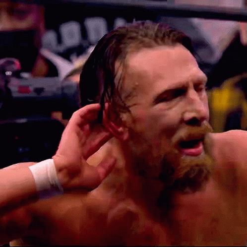 Bearded Man Being Punched In Boxing Ring GIF