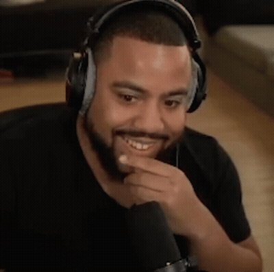 Bearded Man Biting Thumb Wearing Headphones GIF
