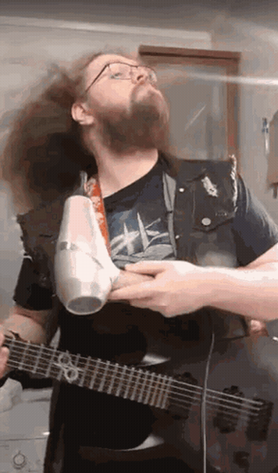 Bearded Man Blow Drying Hair Playing Guitar GIF