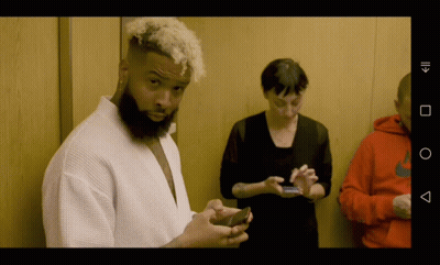 Bearded Man Checking Phone Woman Watching GIF