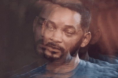 Bearded Man Close-Up Looking At Camera GIF