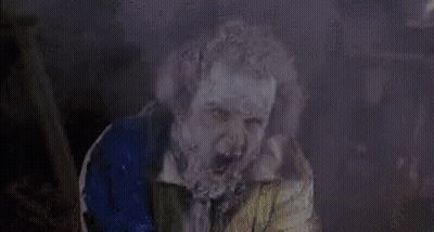 Bearded Man Covered In Ice In Blue Jacket GIF