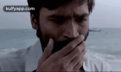 Bearded Man Covering Mouth With Hand GIF