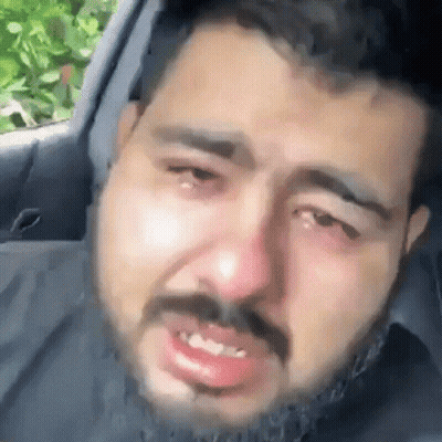 Bearded Man Crying In Back Seat GIF