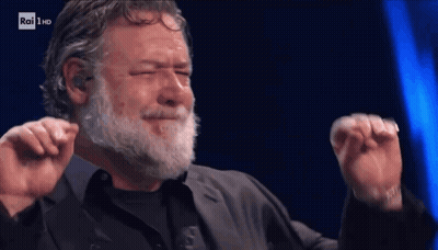 Bearded Man Dancing Before Rai HD Screen GIF