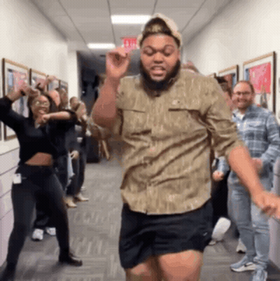 Bearded Man Dancing In Hallway GIF