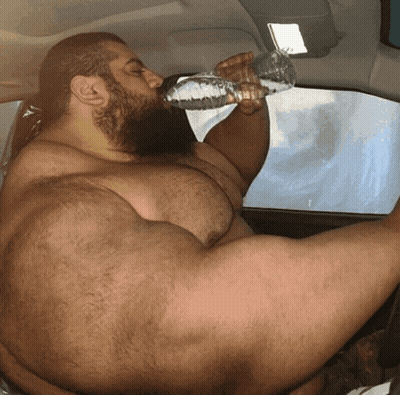 Bearded Man Drinking From Bottle GIF