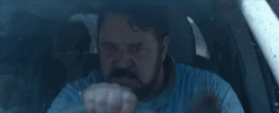 Bearded Man Driving Car Making Face GIF