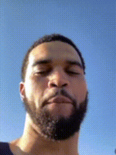 Bearded Man Eyes Closed Looking At Camera GIF