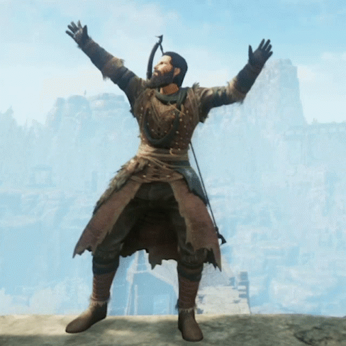 Bearded Man Flexing Muscles In Front Of Mountain GIF