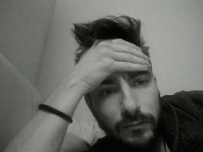 Bearded Man Hand To Forehead Black And White GIF