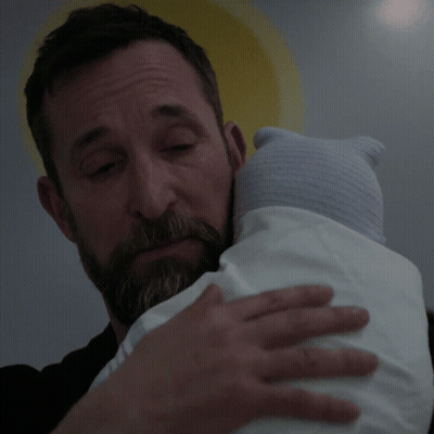Bearded Man Holding Baby With Blue Hat GIF