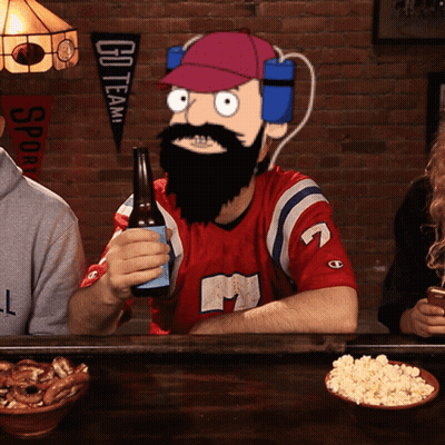 Bearded Man Holding Beer In Front Of Go Team Banner GIF