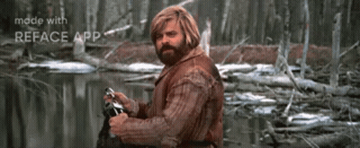 Bearded Man Holding Camera By River GIF