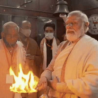 Bearded Man Holding Candle By Clock Saying 10 GIF