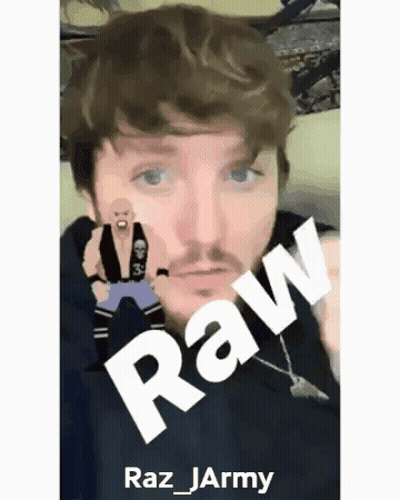 Bearded Man Holding Cartoon Figure Saying Raw GIF