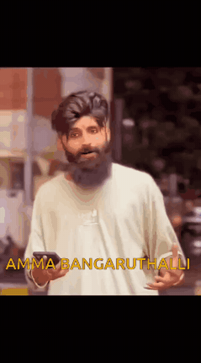 Bearded Man Holding Cell Phone Says Amma Bangaruthalli GIF