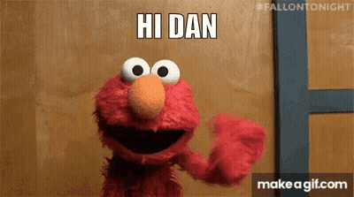 Bearded Man Holding Flowers In Front Of Onlydans.com Sign GIF