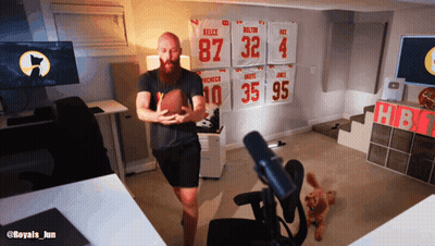 Bearded Man Holding Football In Front Of Jersey Wall 87 32 4 35 95 GIF