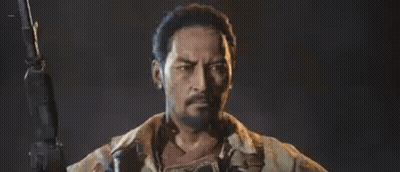 Bearded Man Holding Gun GIF