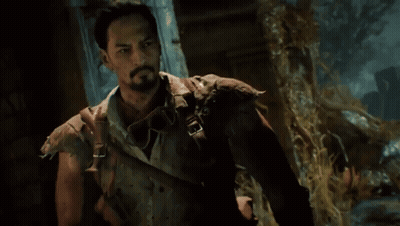 Bearded Man Holding Gun GIF
