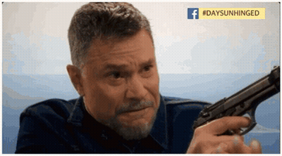 Bearded Man Holding Gun GIF