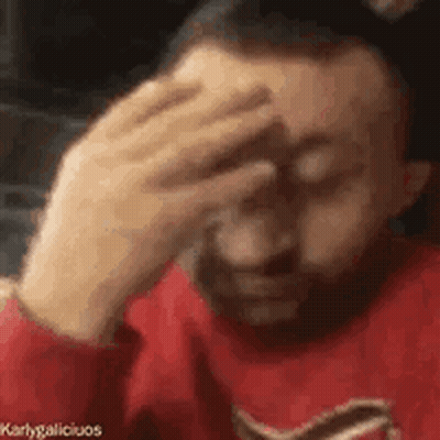 Bearded Man Holding Hand To Forehead GIF