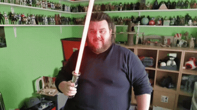 Bearded Man Holding Light Saber GIF