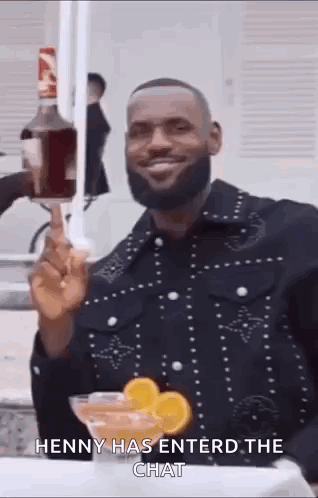 Bearded Man Holding Liquor Bottle And Martini Glass GIF