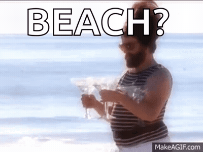Bearded Man Holding Martini On Beach Saying Beach GIF