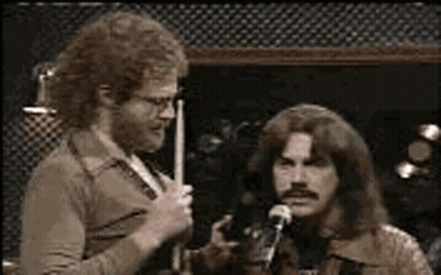 Bearded Man Holding Microphone Saying More Birthday GIF