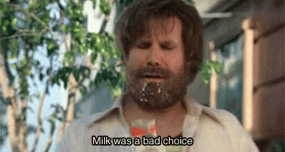 Bearded Man Holding Milk In Mouth Says Milk Bad Choice GIF