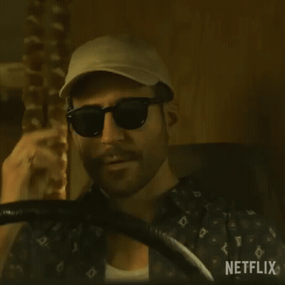 Bearded Man Holding Steering Wheel And Hat GIF