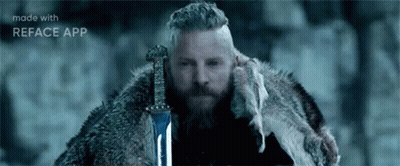 Bearded Man Holding Sword In Snow GIF