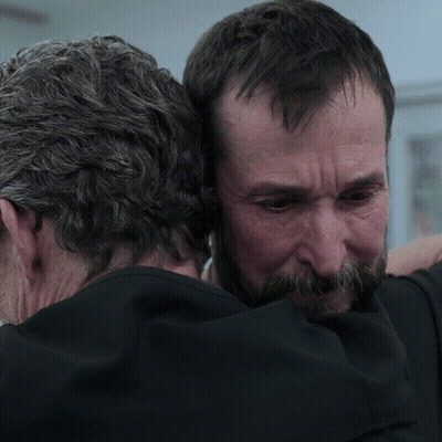 Bearded Man Hugging Man In Black Shirt GIF
