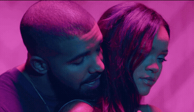 Bearded Man Hugging Woman In Purple Light GIF