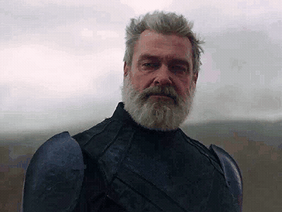Bearded Man In Armor And Black Jacket GIF