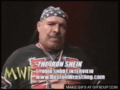 Bearded Man In Bandana And Boston Wrestling Shirt GIF