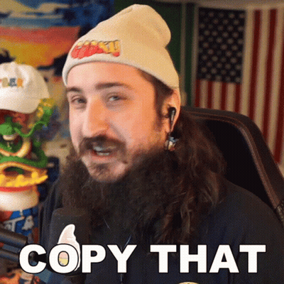 Bearded Man In Beanie And Earbuds Saying Copy That GIF