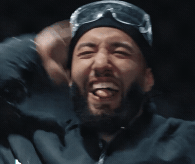 Bearded Man In Beanie And Goggles Laughs GIF