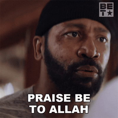 Bearded Man In Beanie Saying Praise Be To Allah GIF