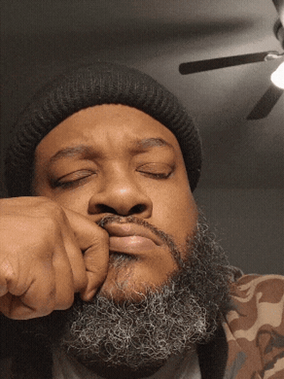 Bearded Man In Black Beanie And Camo Jacket GIF
