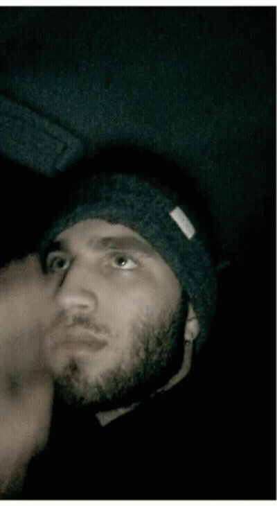 Bearded Man In Black Beanie Shushing GIF
