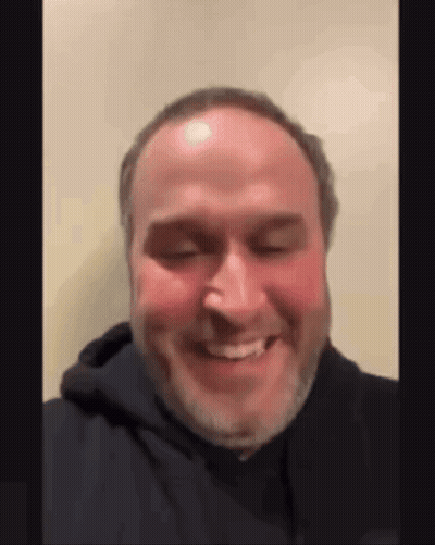 Bearded Man In Black Hoodie Smiling GIF
